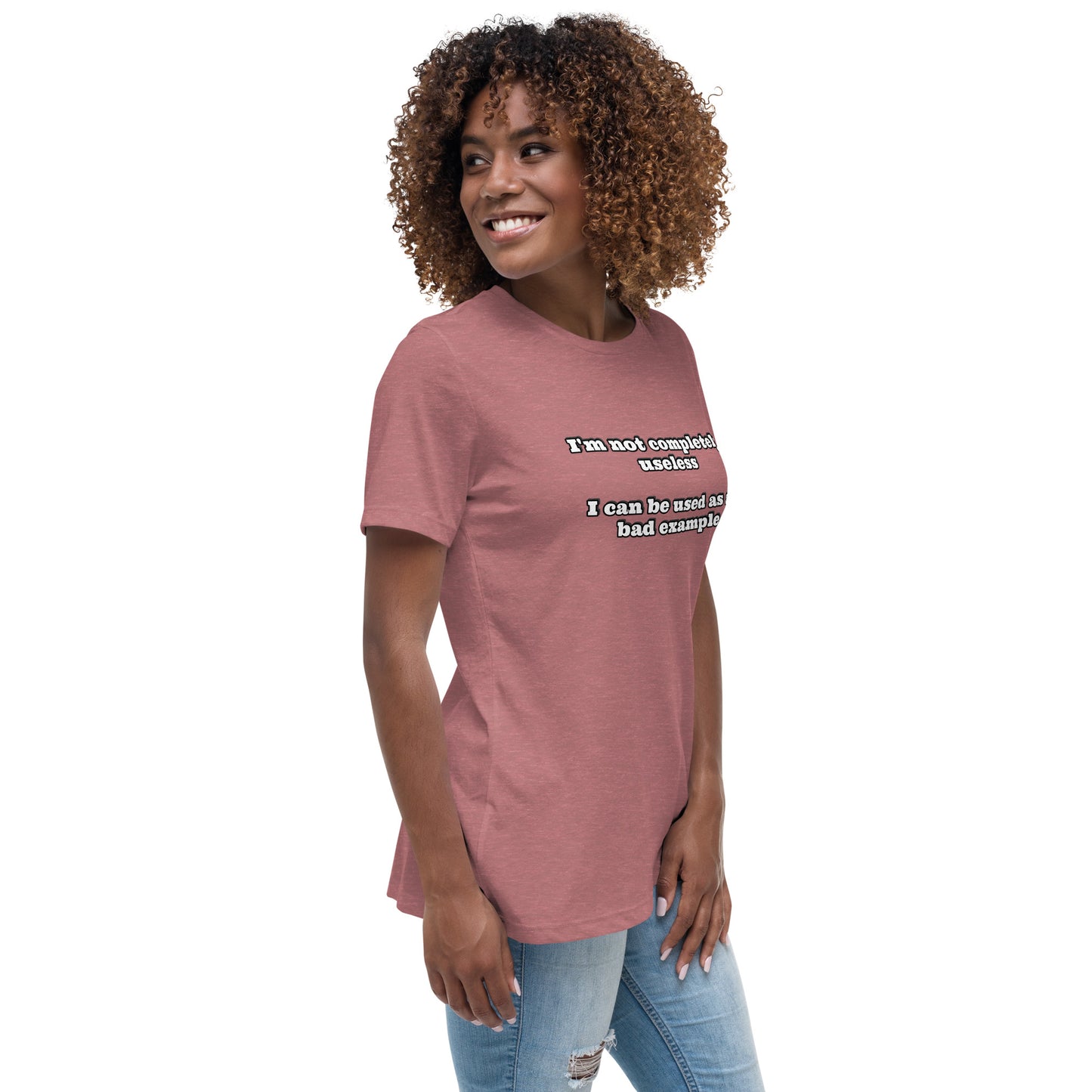 Women with mauve t-shirt with text “I'm not completely useless I can be used as a bad example”