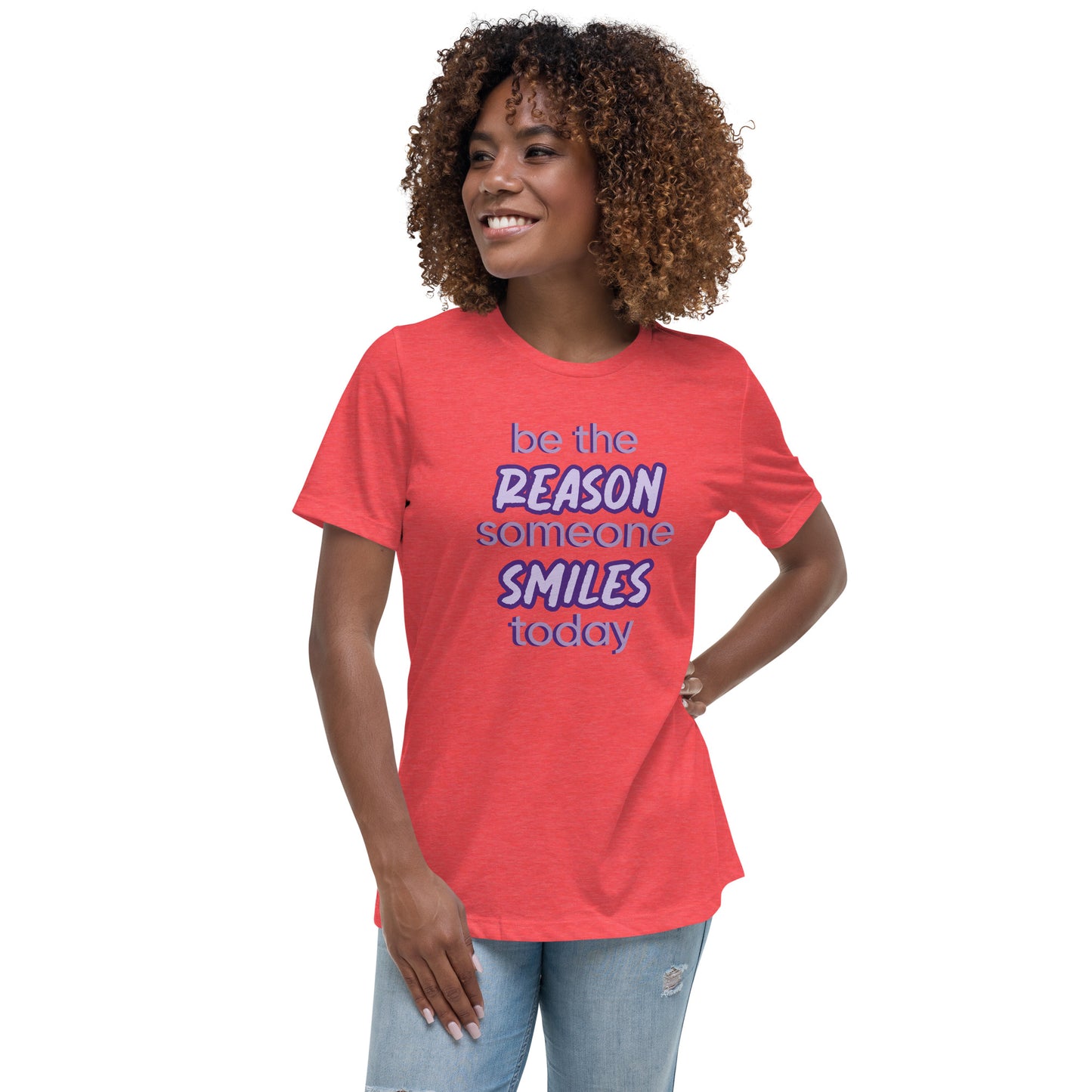 Woman with red T-shirt and the quote "be the reason someone smiles today" in purple on it.
