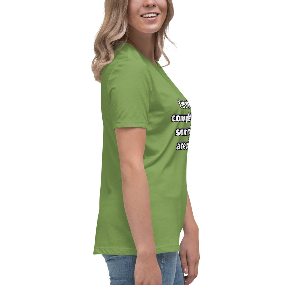 Women with leaf green t-shirt with text “I’m not a complete idiot, some pieces are missing”