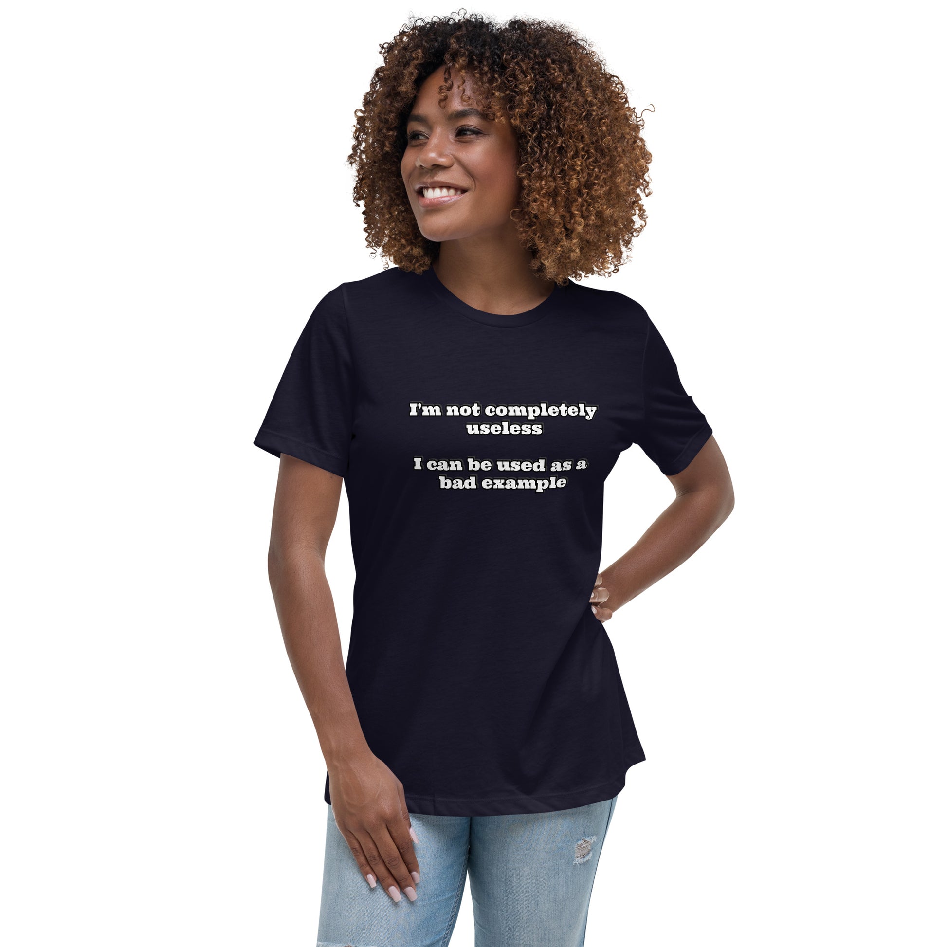 Women with dark grey t-shirt with text “I'm not completely useless I can be used as a bad example”