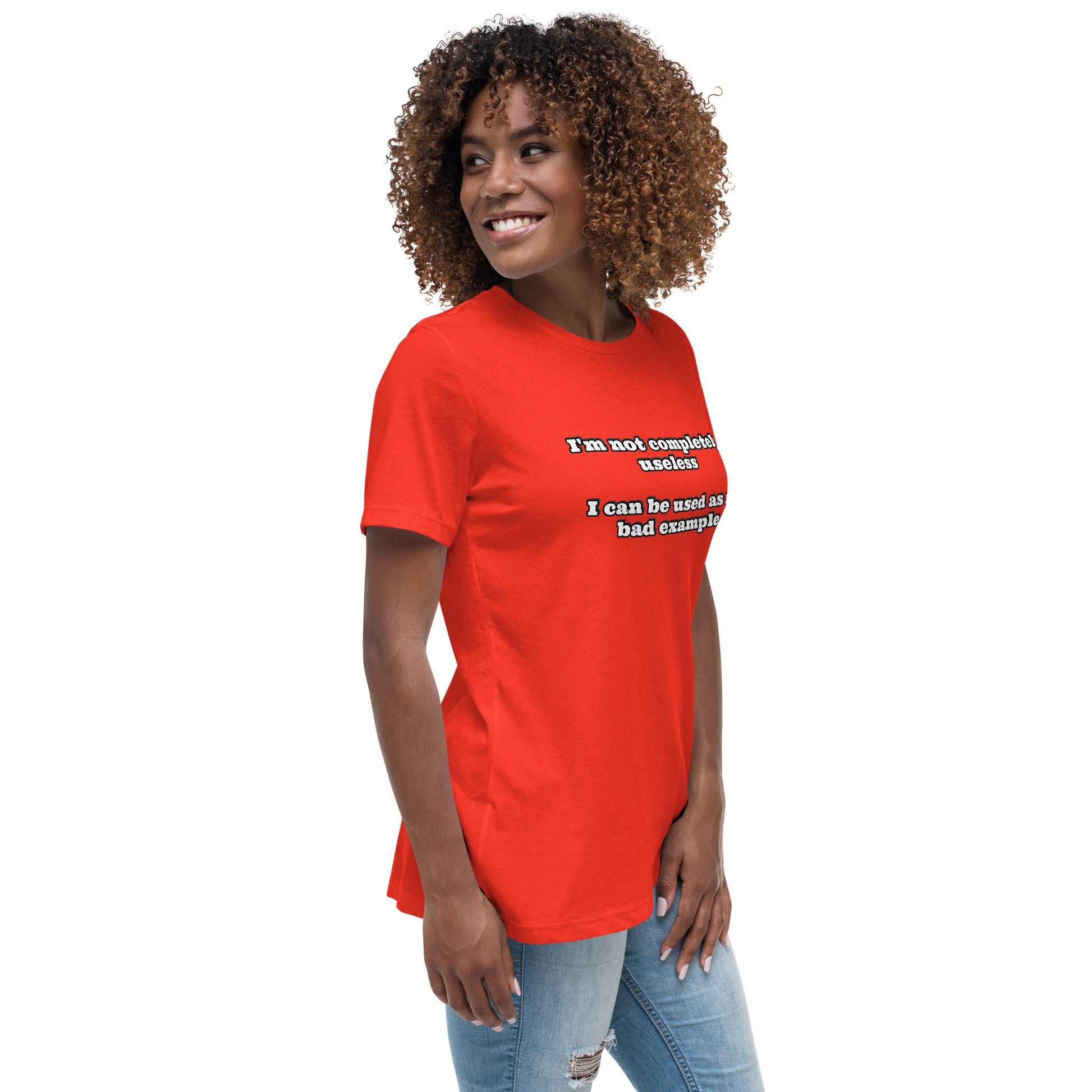Women with red t-shirt with text “I'm not completely useless I can be used as a bad example”