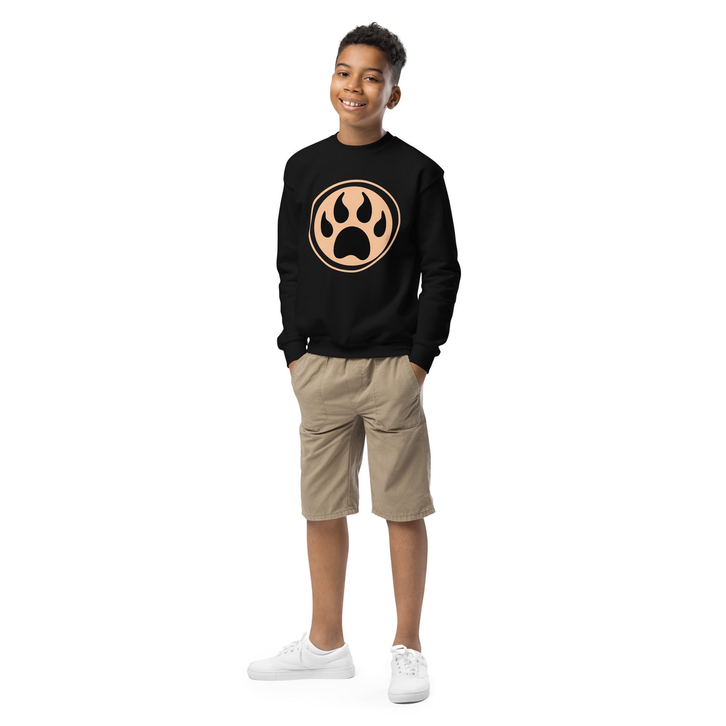 Youth with black sweatshirt and a print of a wolf claw