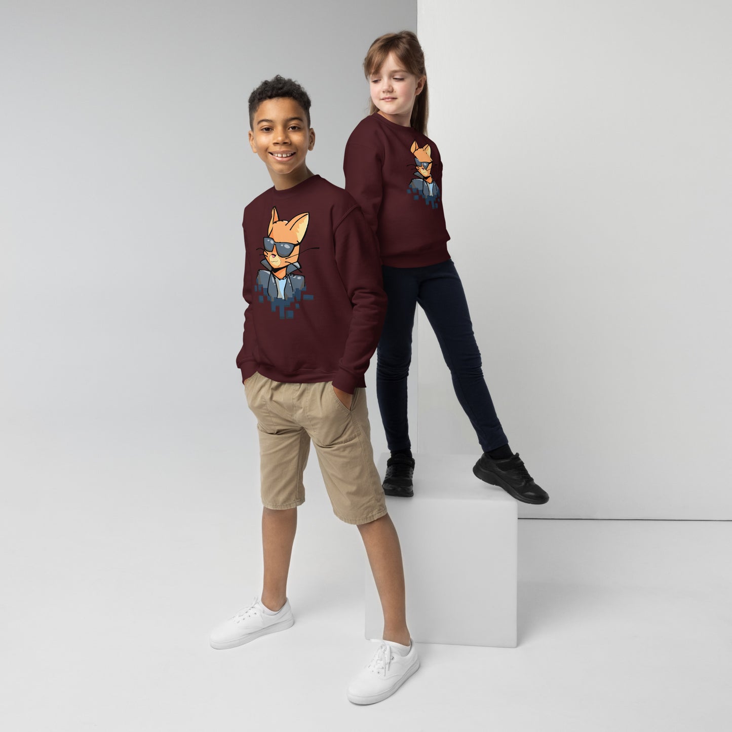 Youth (girl and boy) with maroon sweatshirt with cool cat