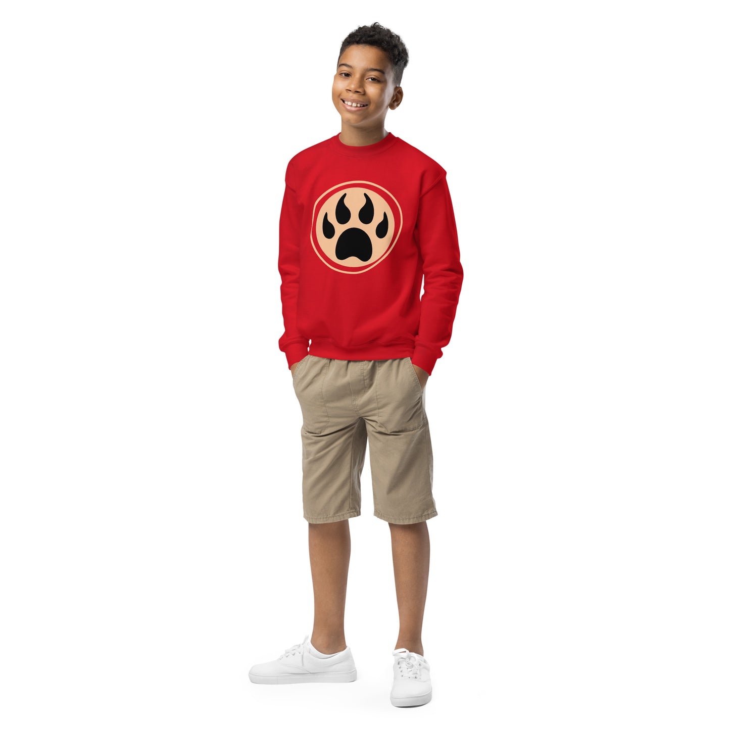 Youth with red sweatshirt and a print of a wolf claw