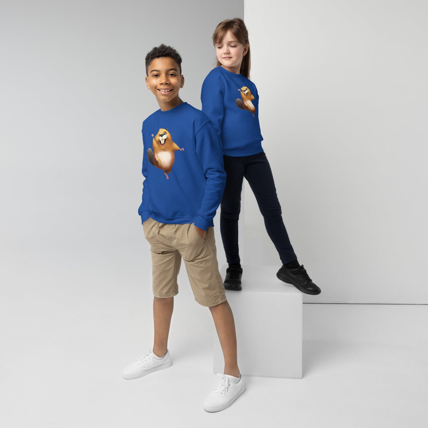Youth (girl and boy) with royal blue sweatshirt with happy beaver