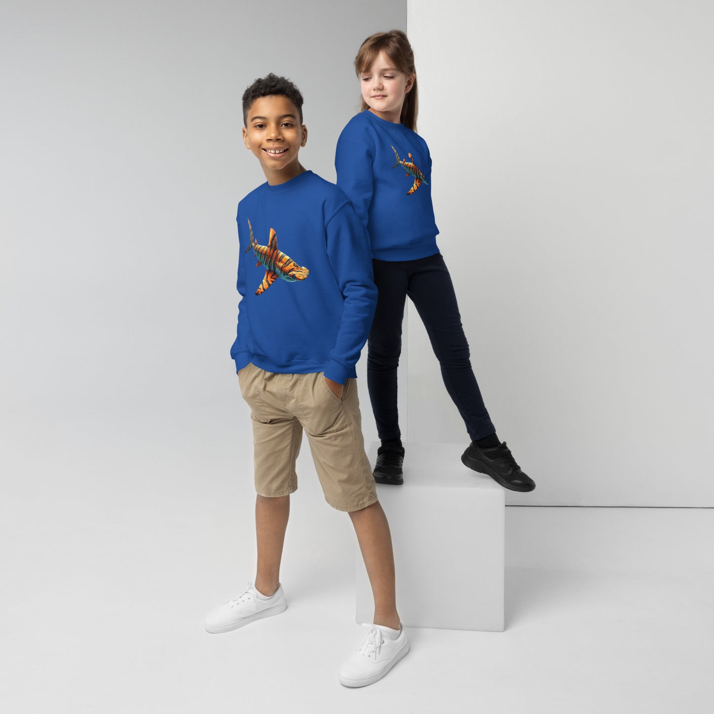 Royal blue sweatshirt for youth with a print of a hammerhead shark