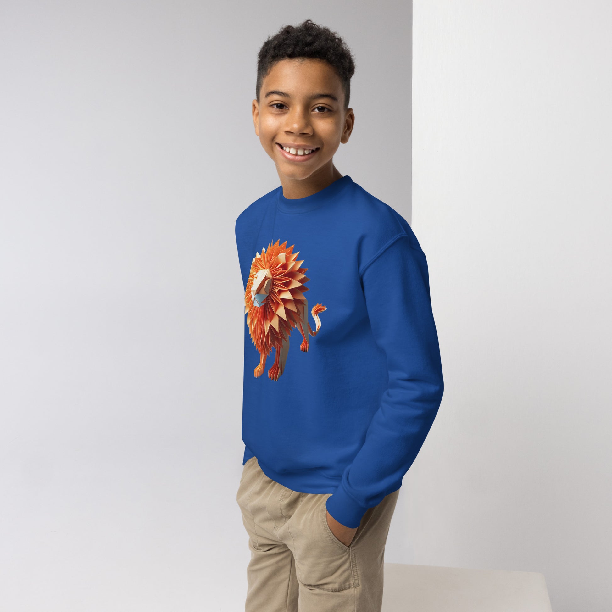 Youth with royal blue Sweater with print of a lion