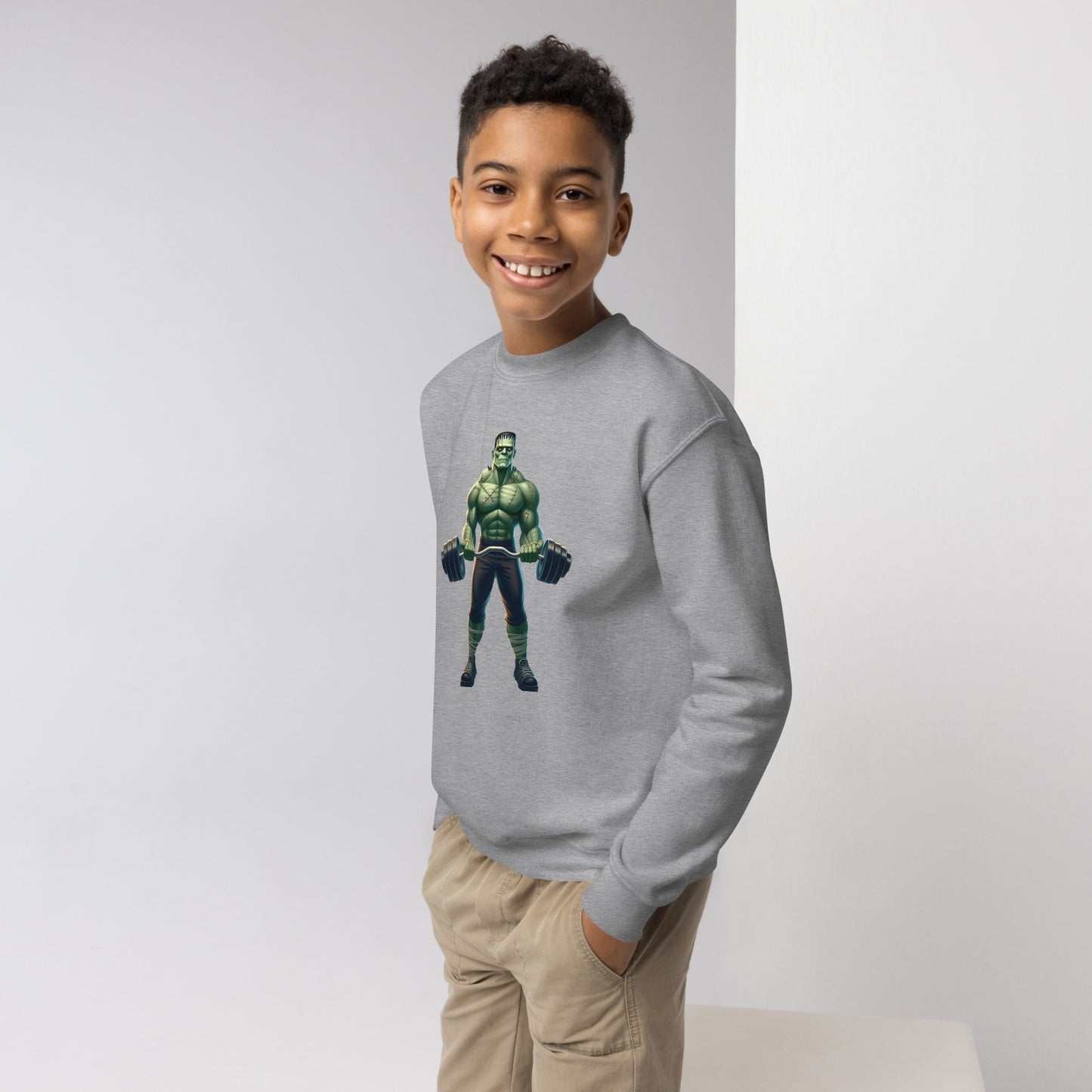 Youth with sport grey sweater with a print of a bodybuilder