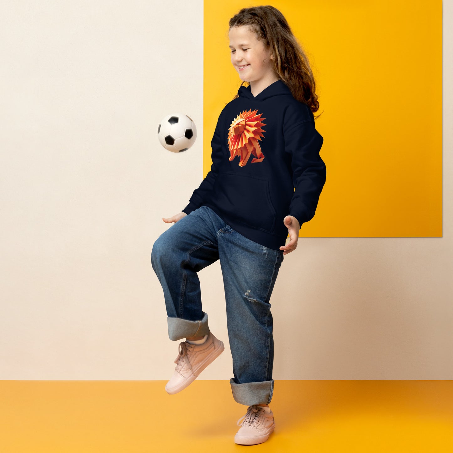 Kid with navy hoodie with print of a lion