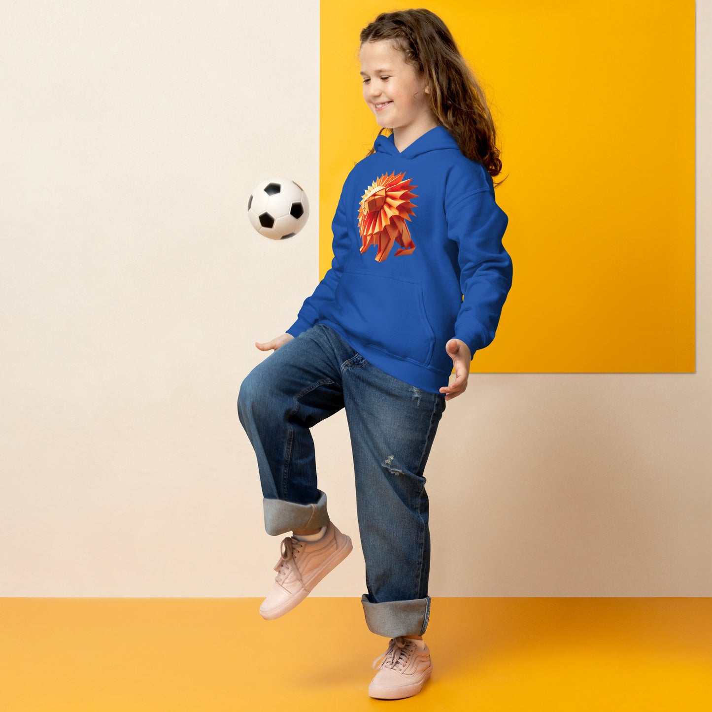 Kid with royal blue hoodie with print of a lion