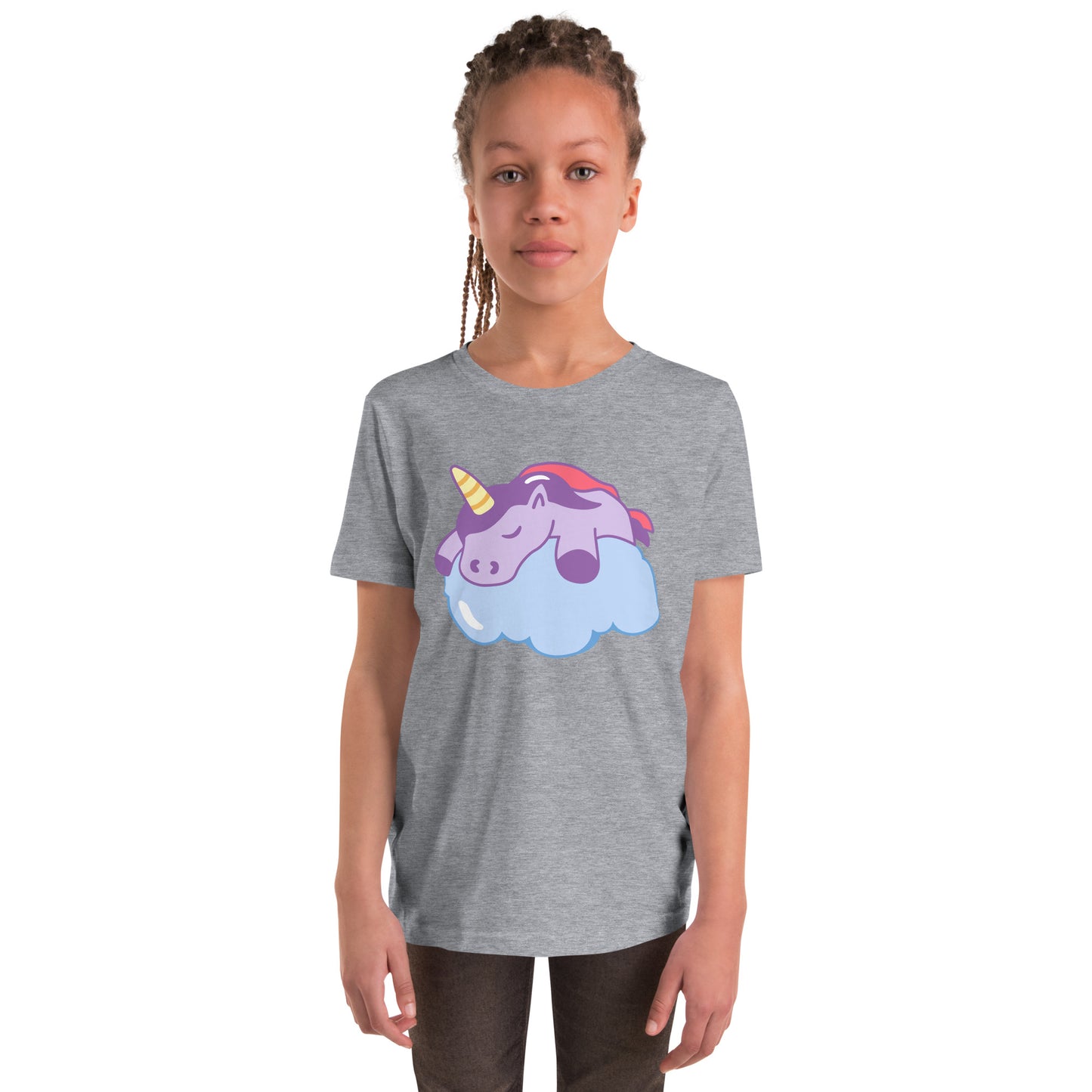Youth with a grey T-shirt with a print of a sleeping unicorn on a cloud
