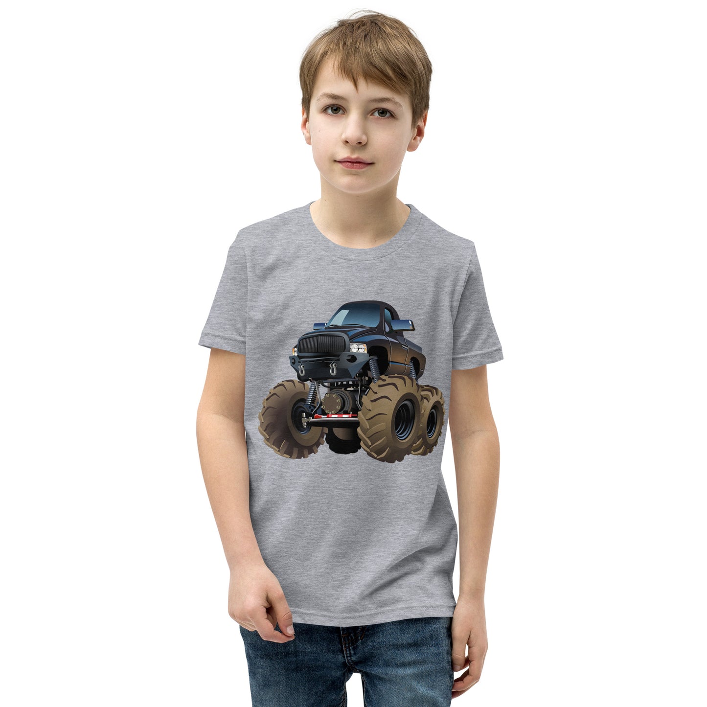 Boy with athletic grey T-shirt with picture of a monstertruck