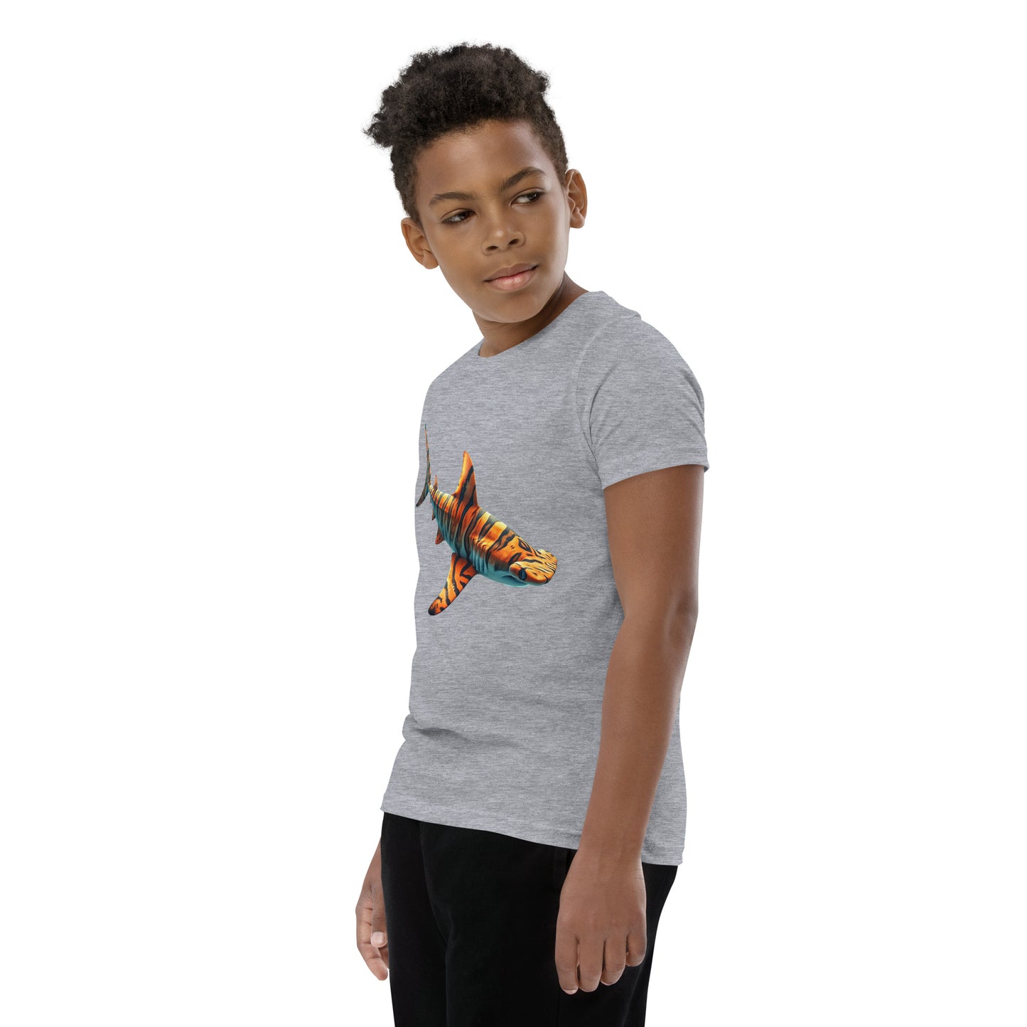 Youth with a grey T-shirt and print of a hammerhead sharp
