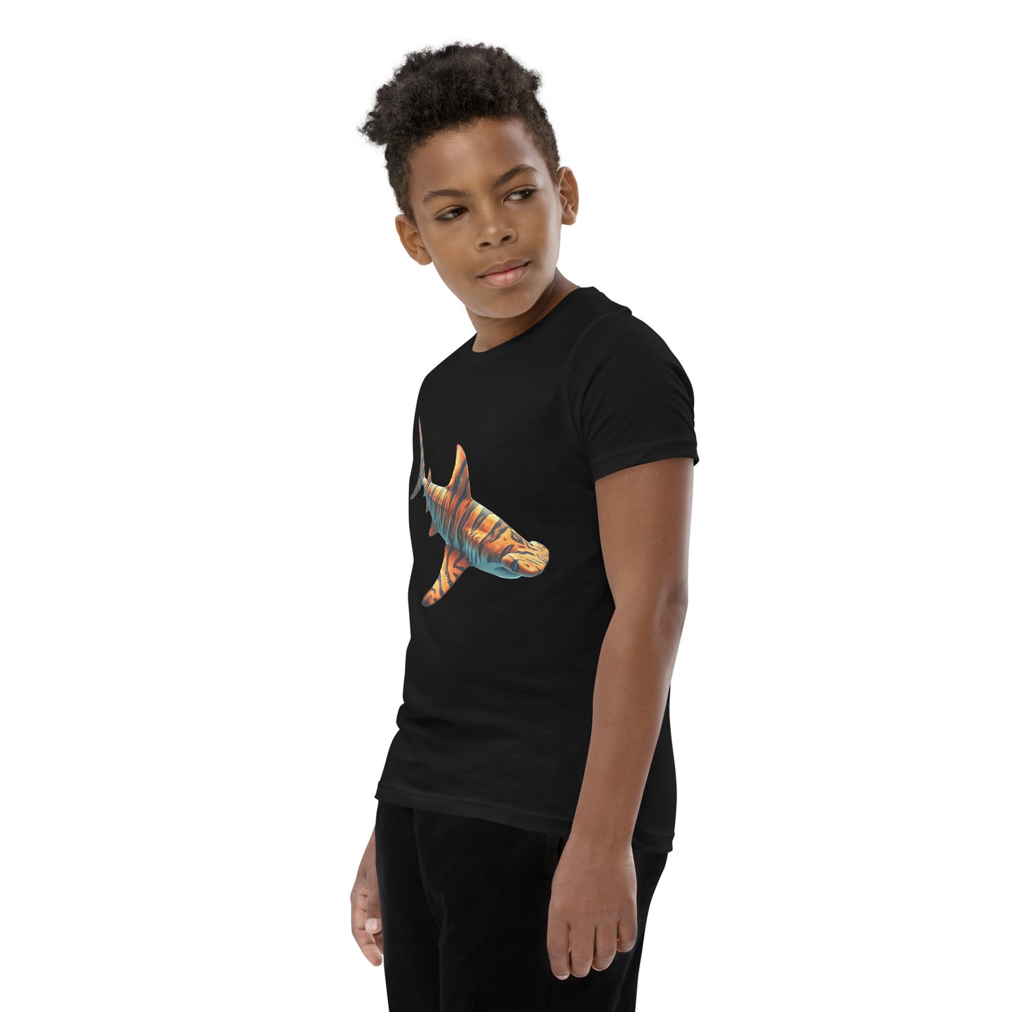 Youth with a black T-shirt and print of a hammerhead sharp
