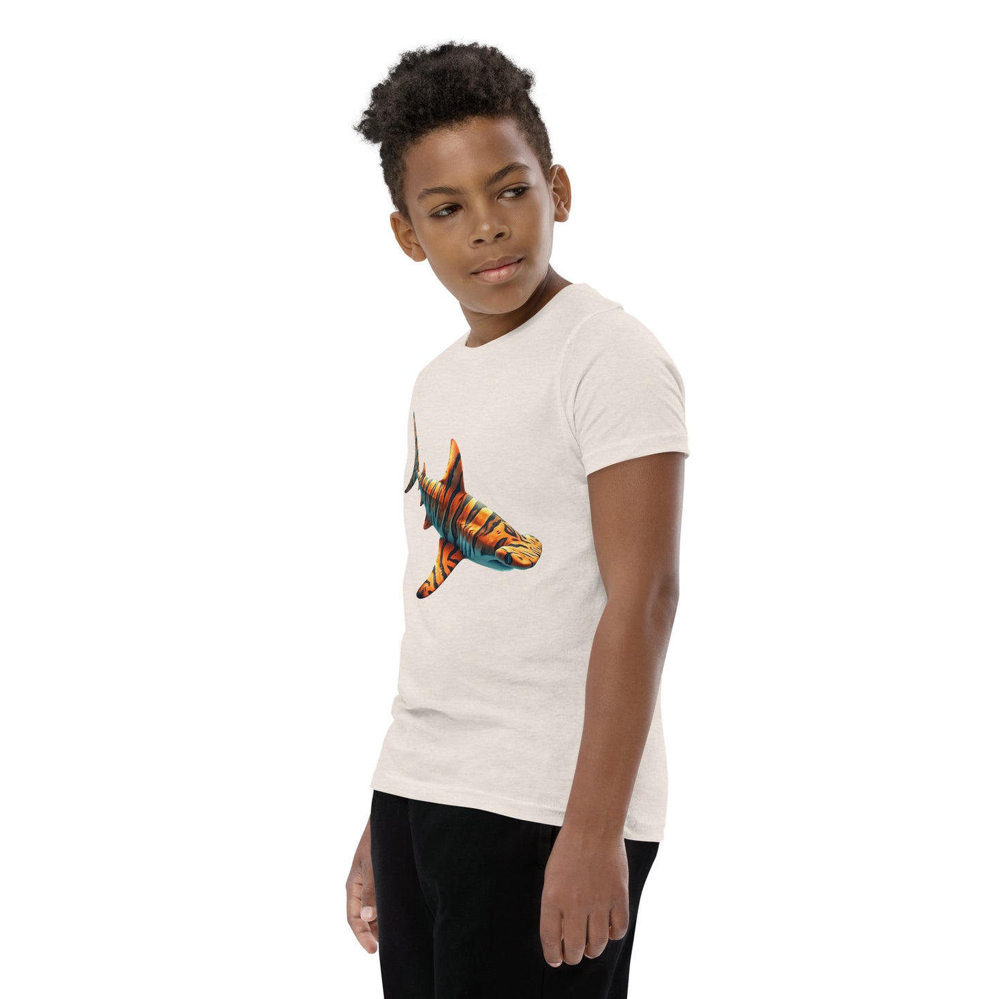 Youth with a dust T-shirt and print of a hammerhead sharp