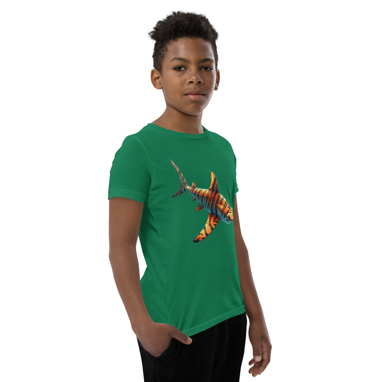 Youth with a green T-shirt and print of a hammerhead sharp