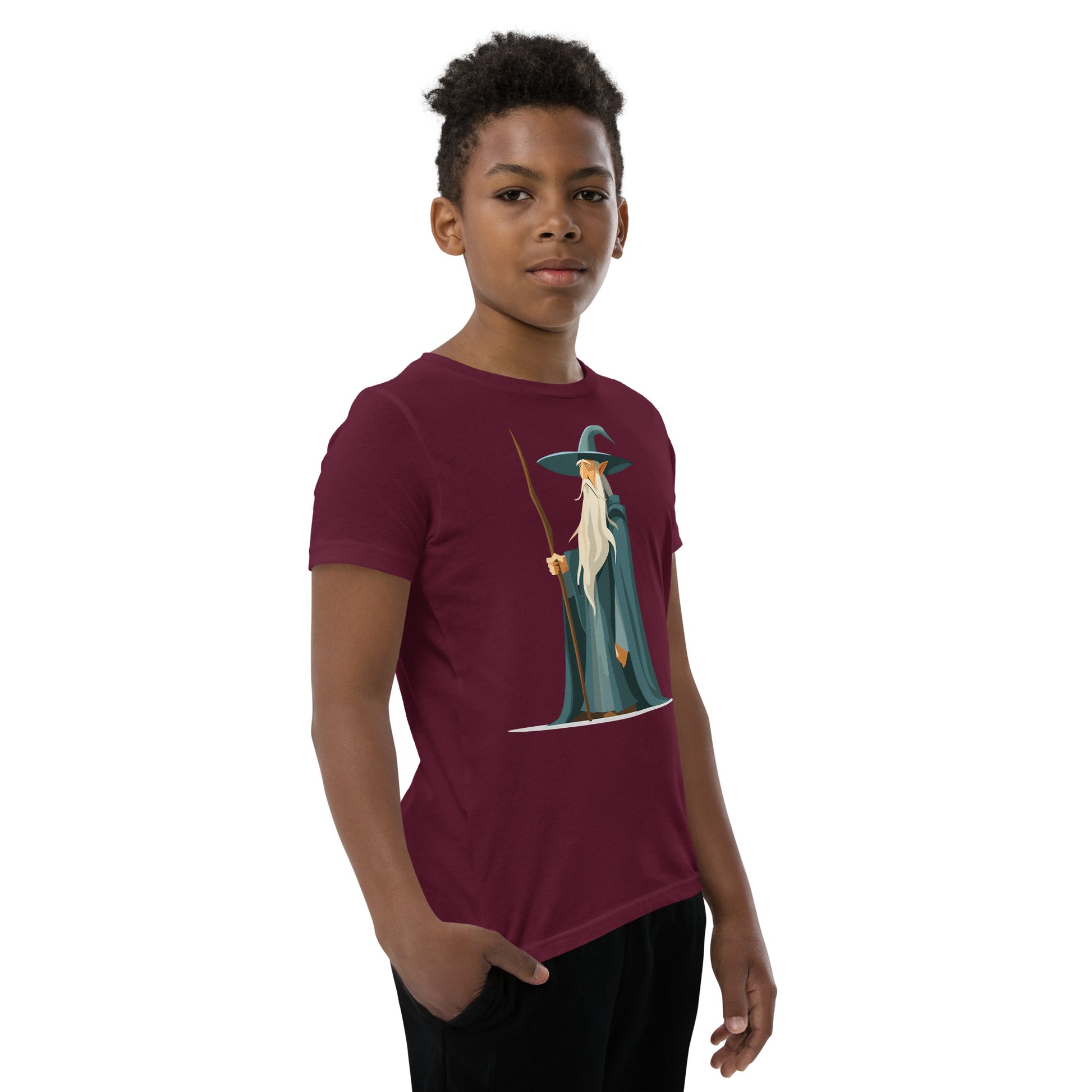 Boy with a maroon T-shirt with a picture of a magician