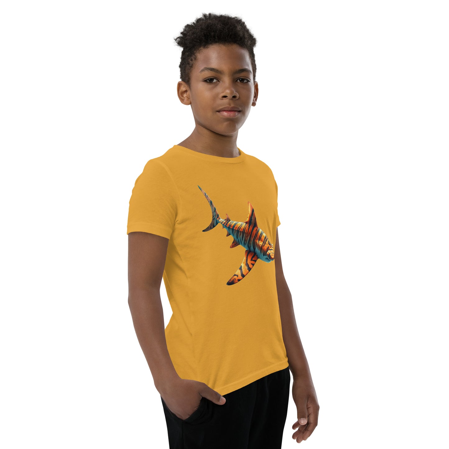 Youth with a mustard T-shirt and print of a hammerhead sharp