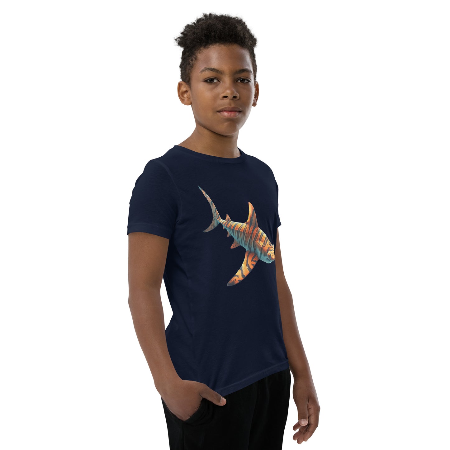 Youth with a navy T-shirt and print of a hammerhead sharp