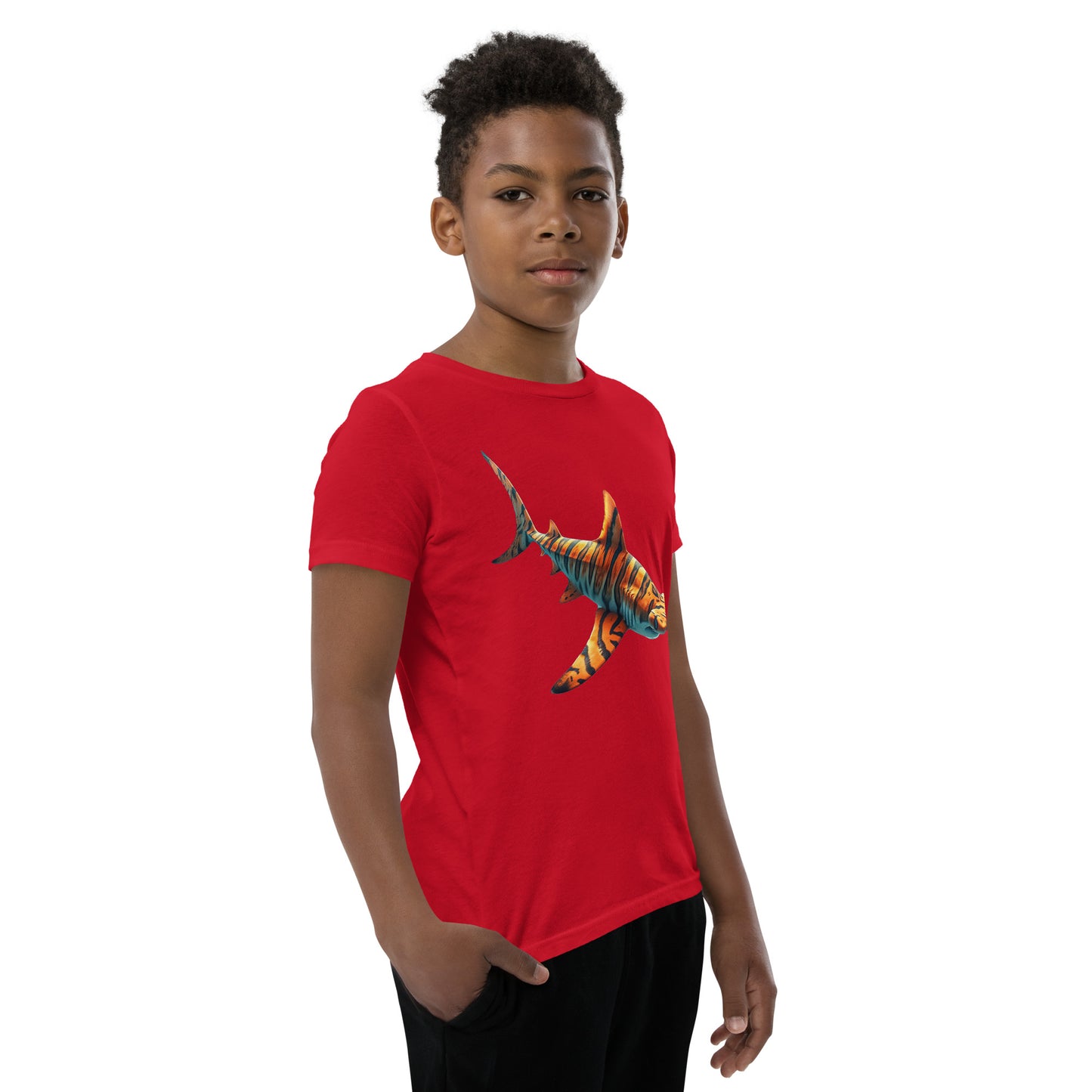 Youth with a red T-shirt and print of a hammerhead sharp
