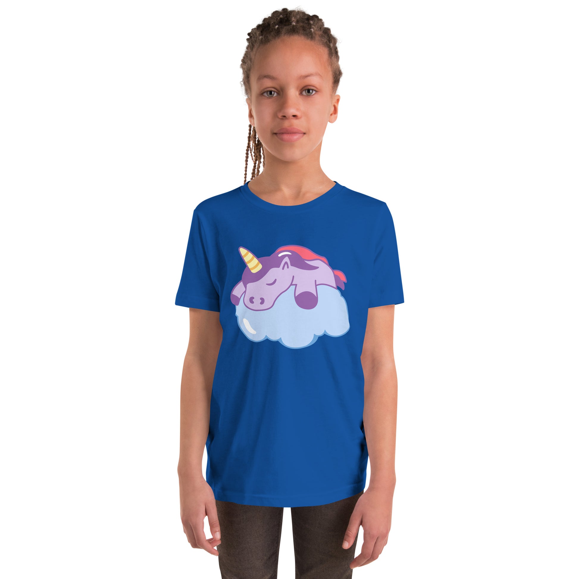 Youth with a royal blue T-shirt with a print of a sleeping unicorn on a cloud