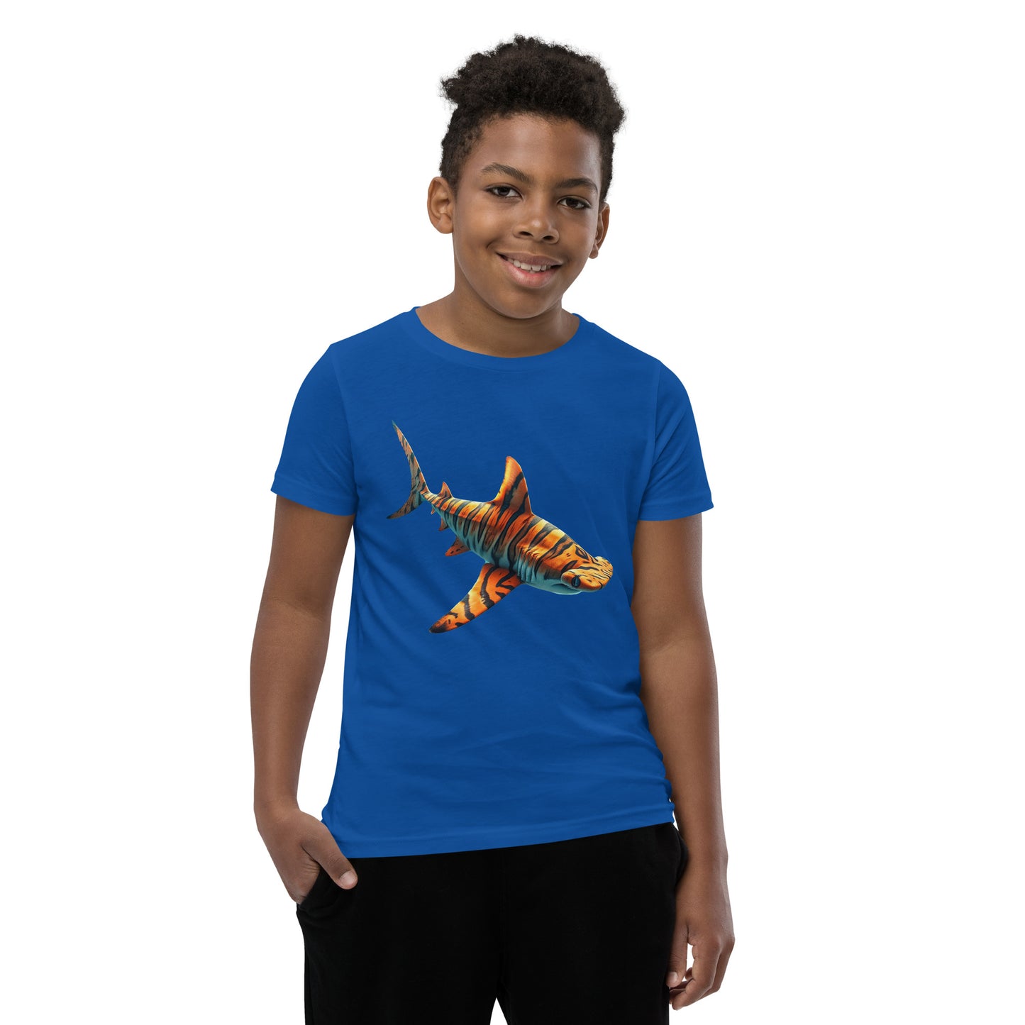 Youth with a royal blue T-shirt and print of a hammerhead sharp