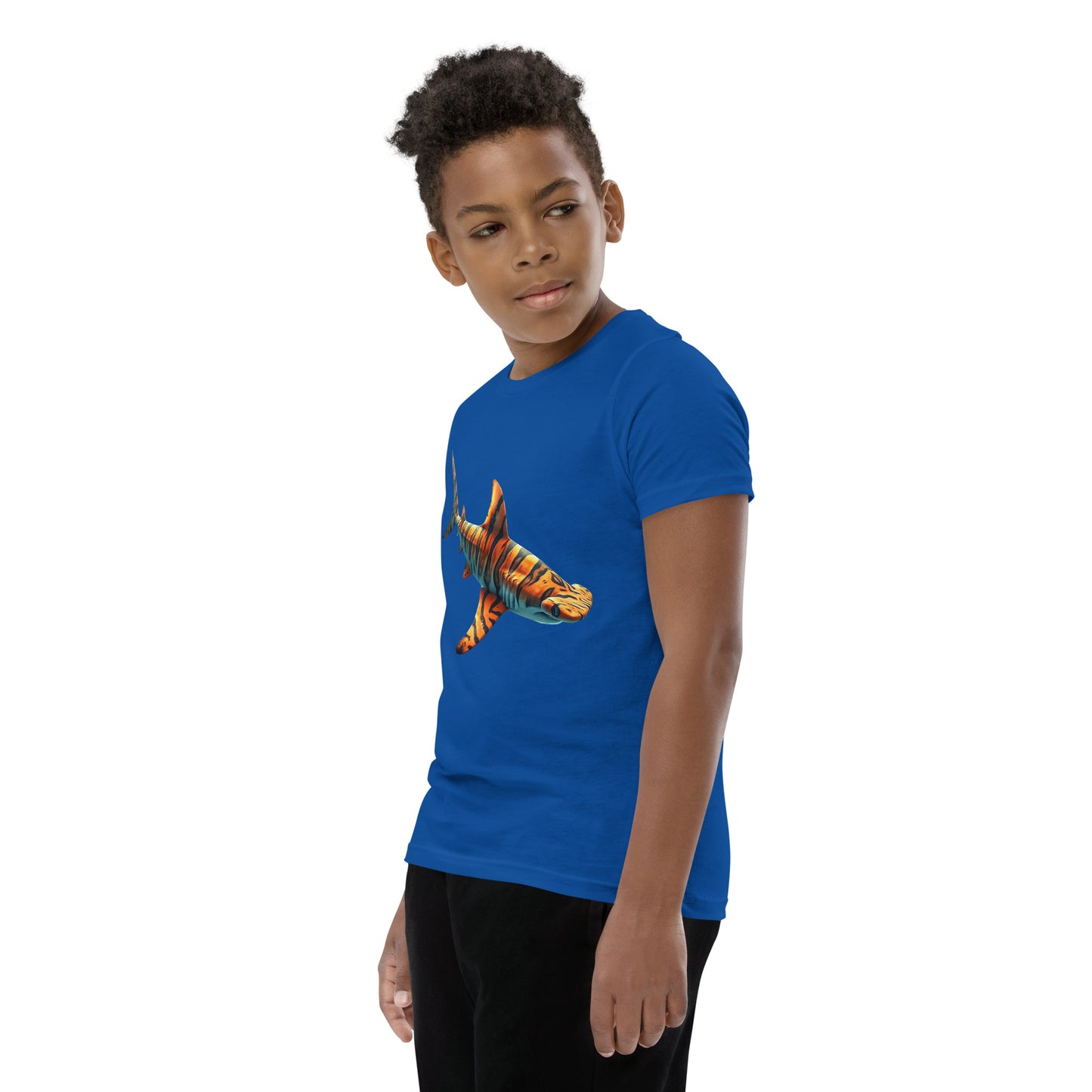 Youth with a royal blue T-shirt and print of a hammerhead sharp