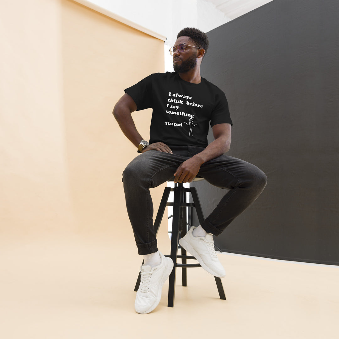 Man with black t-shirt with text "I always think before I say something stupid"