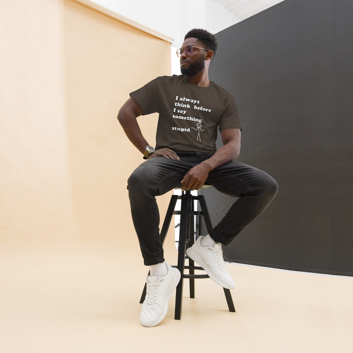 Man with brown t-shirt with text "I always think before I say something stupid"