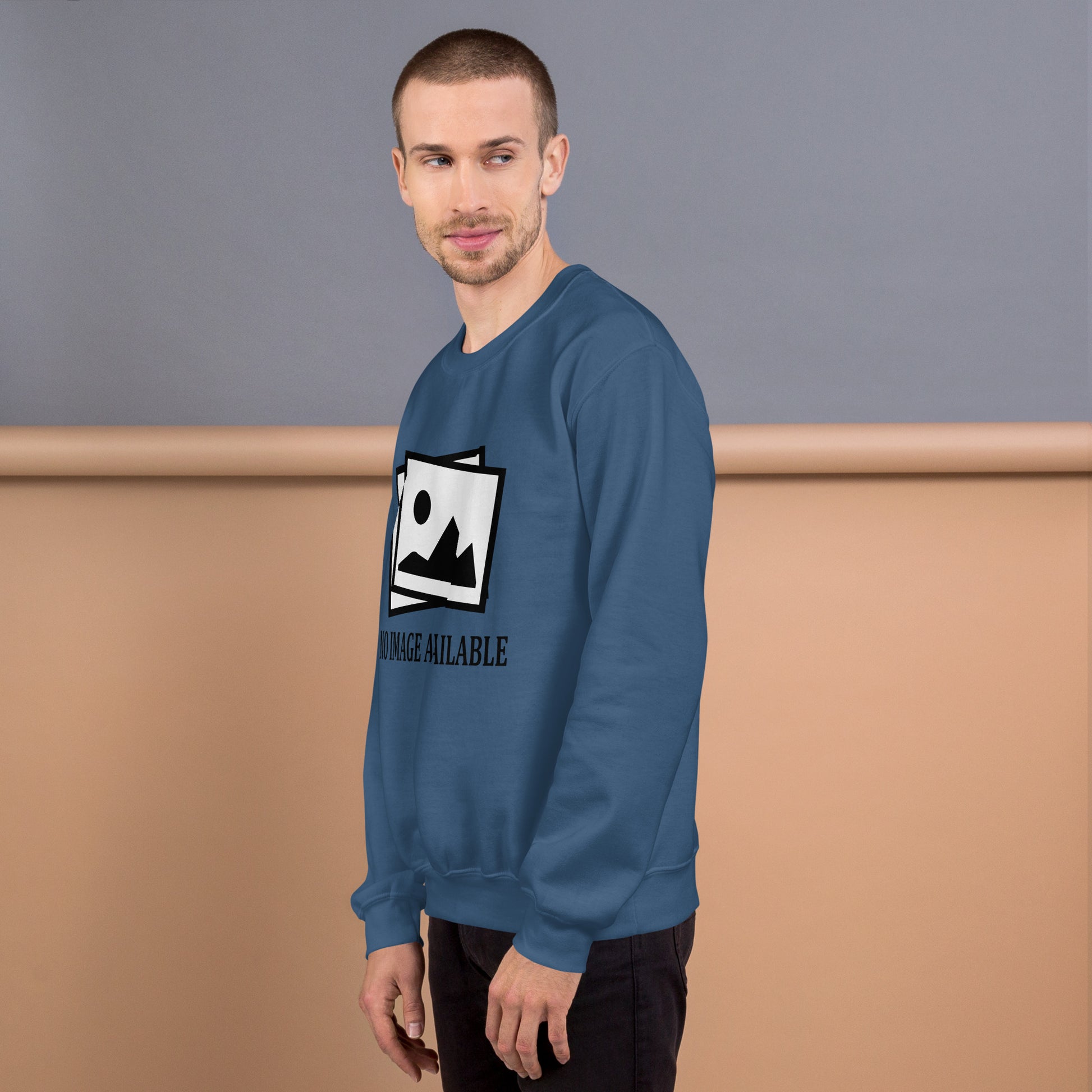 Men with indigo blue sweatshirt with image and text "no image available"