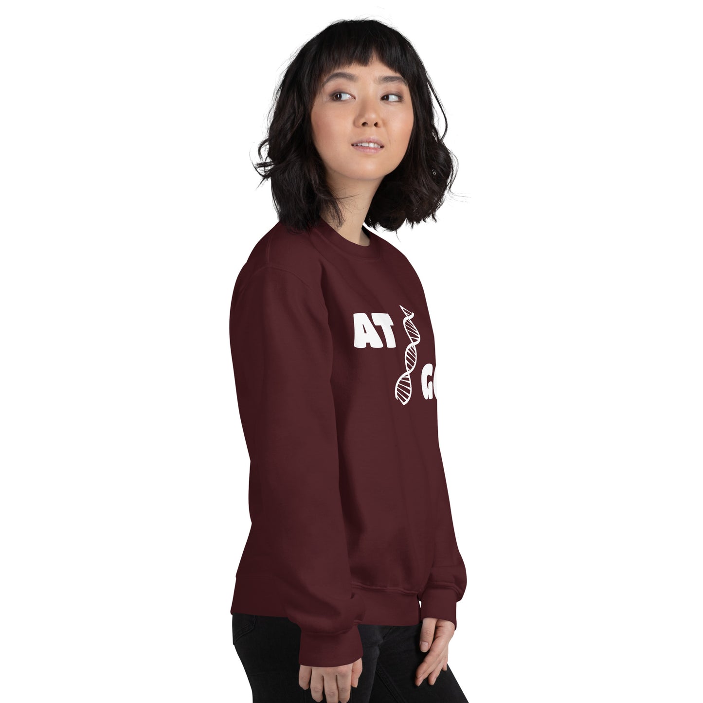 Women with maroon sweatshirt with image of a DNA string and the text "ATGC"