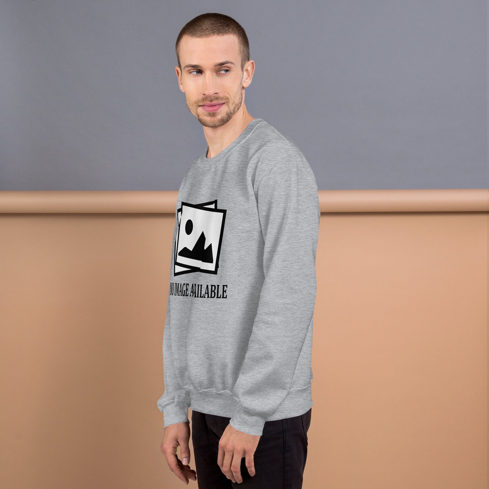 Men with grey sweatshirt with image and text "no image available"