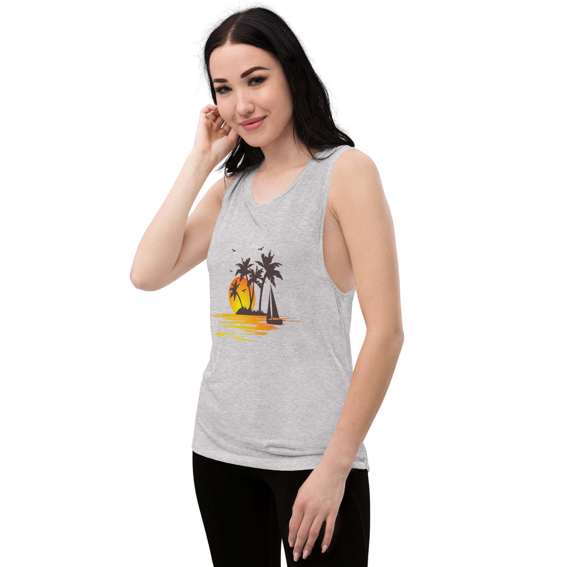 Women with athletic muscle tank with a picture of sunset, palm trees and sailboat