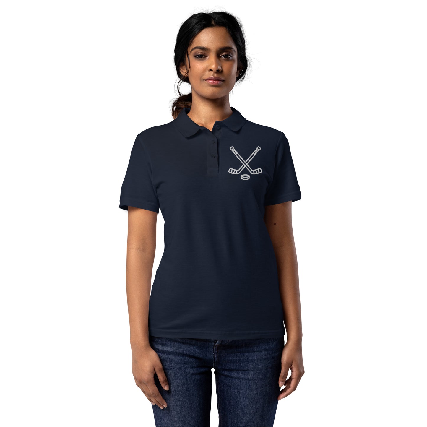 Women with navy poloshirt with print of hockeysticks and puk