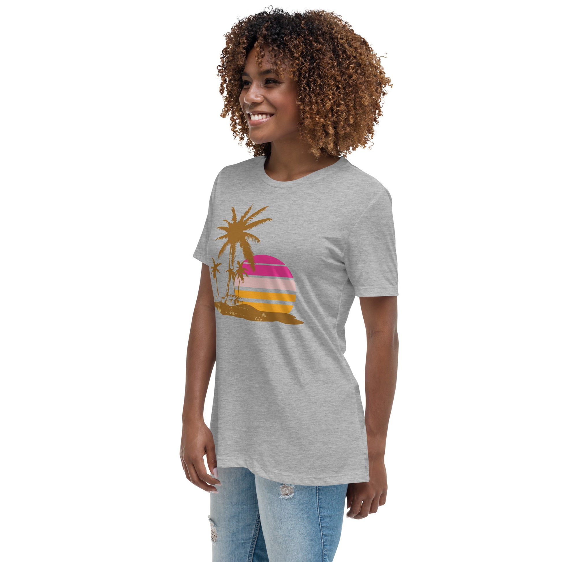 Woman with athletic T-shirt and a picture of brown palm trees and a pink sunset