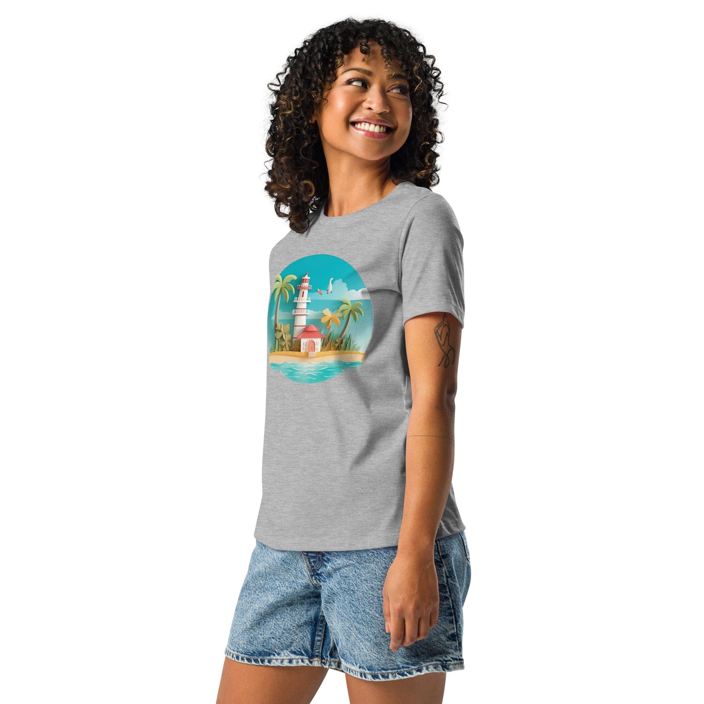 Woman with grey t-shirt with picture of lighthouse and palm trees