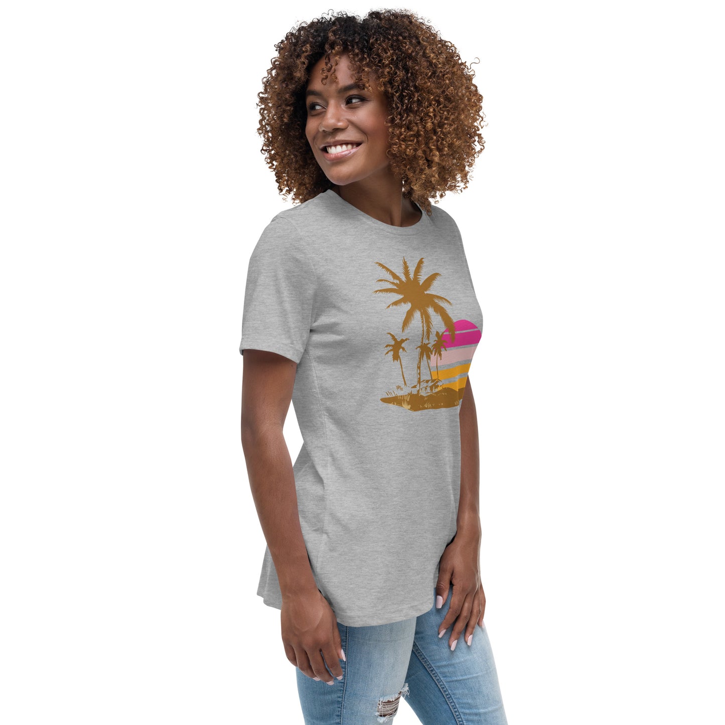 Woman with athletic T-shirt and a picture of brown palm trees and a pink sunset