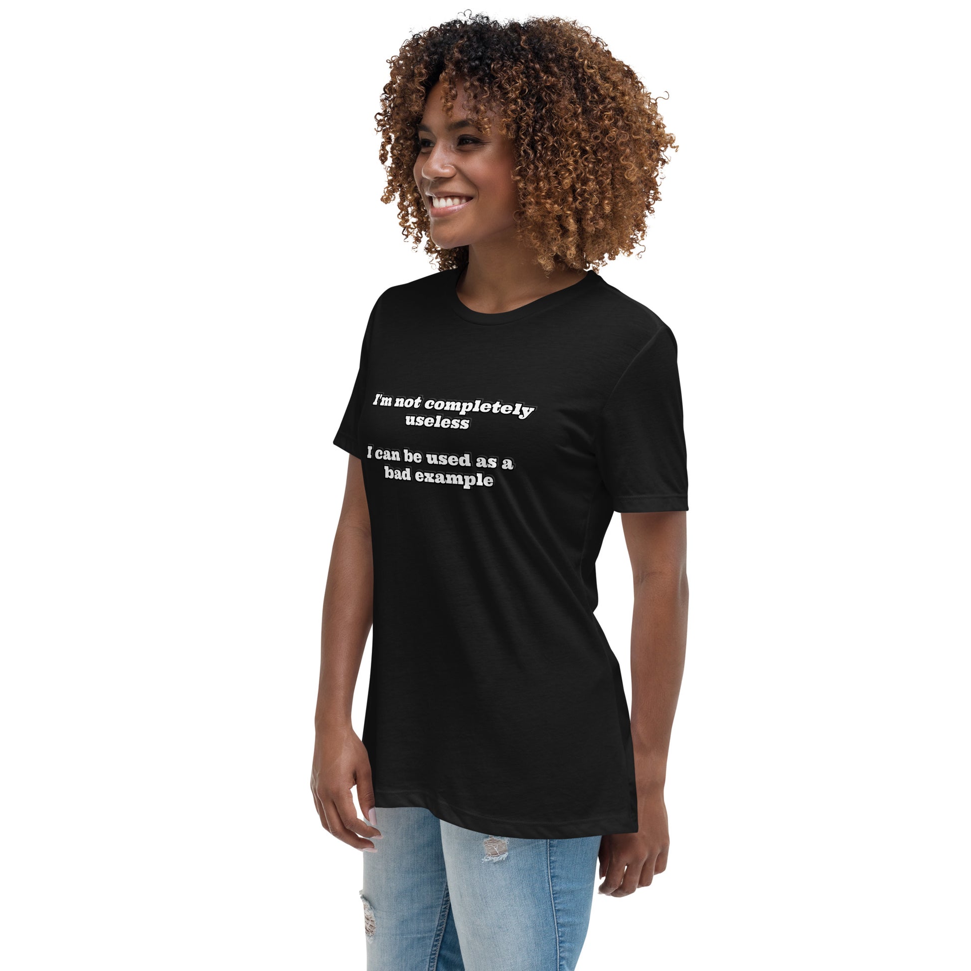 Women with dark grey t-shirt with text “I'm not completely useless I can be used as a bad example”