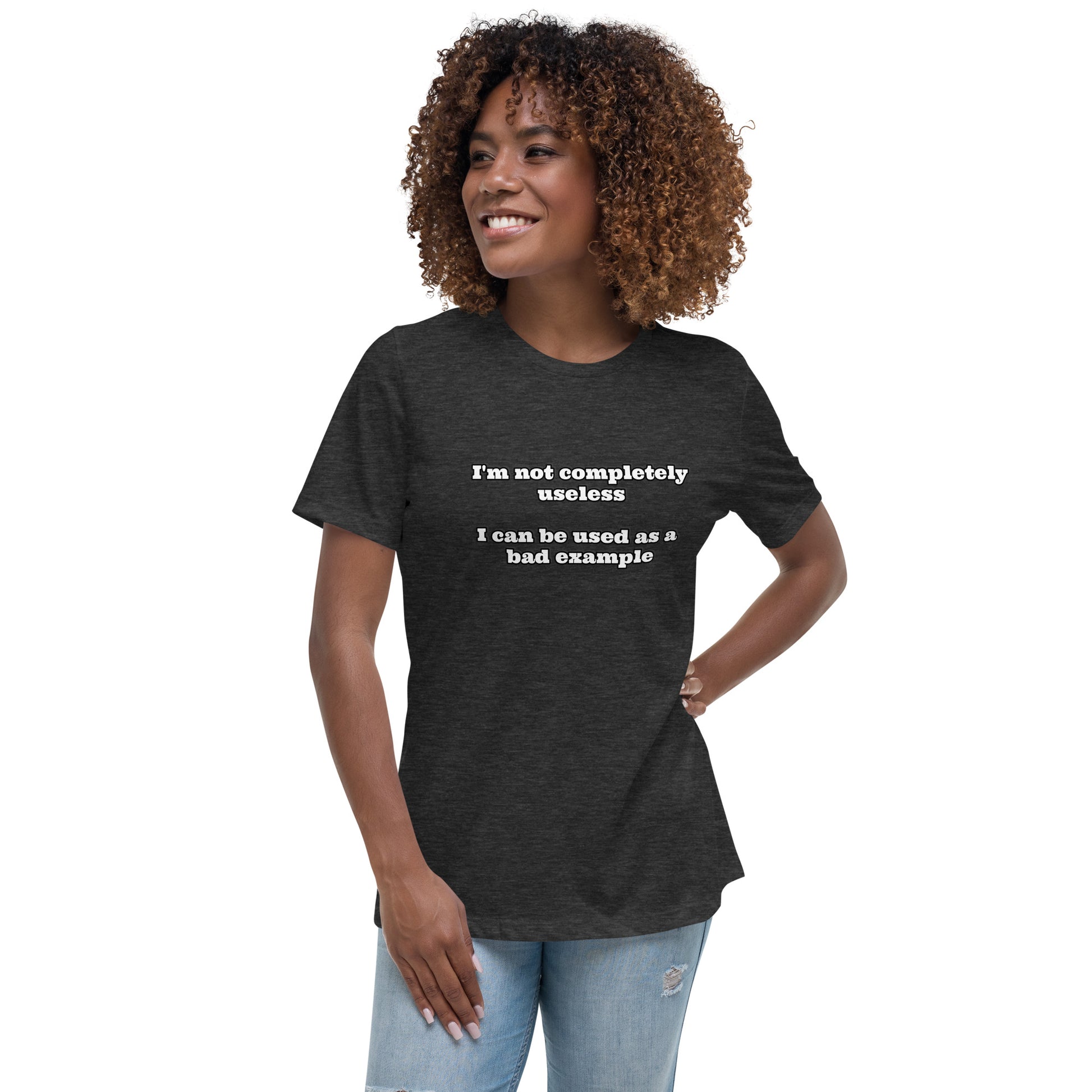 Women with dark grey t-shirt with text “I'm not completely useless I can be used as a bad example”