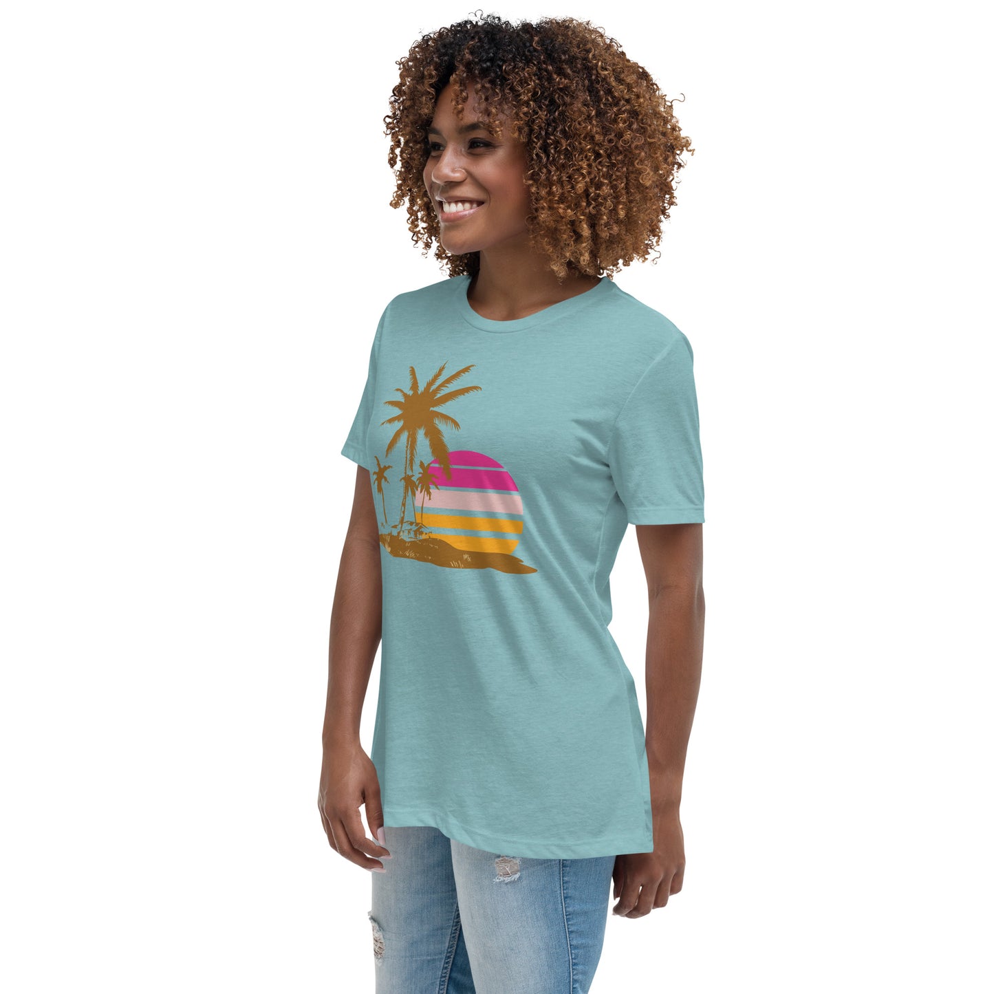 Woman with blue lagoon T-shirt and a picture of brown palm trees and a pink sunset