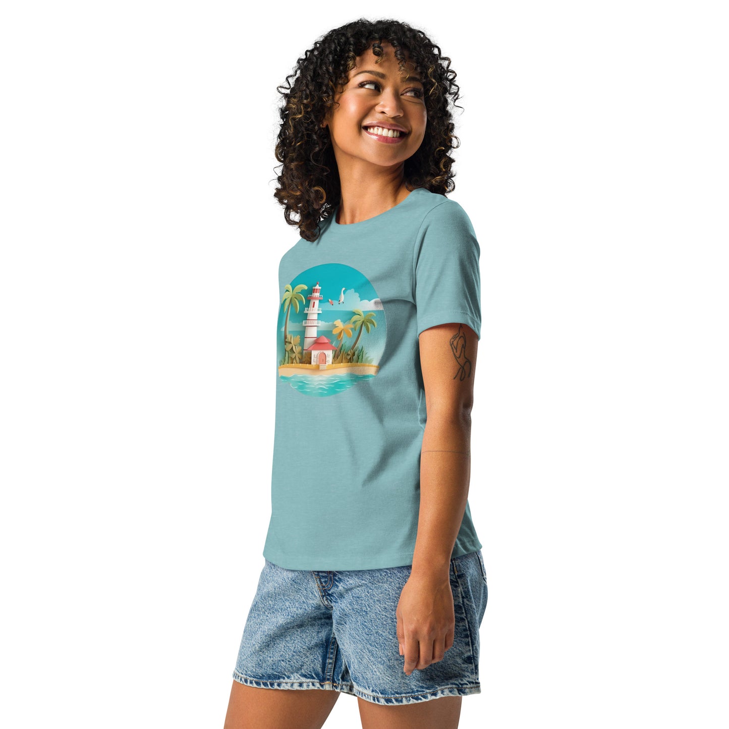 Woman with blue lagoon t-shirt with picture of lighthouse and palm trees