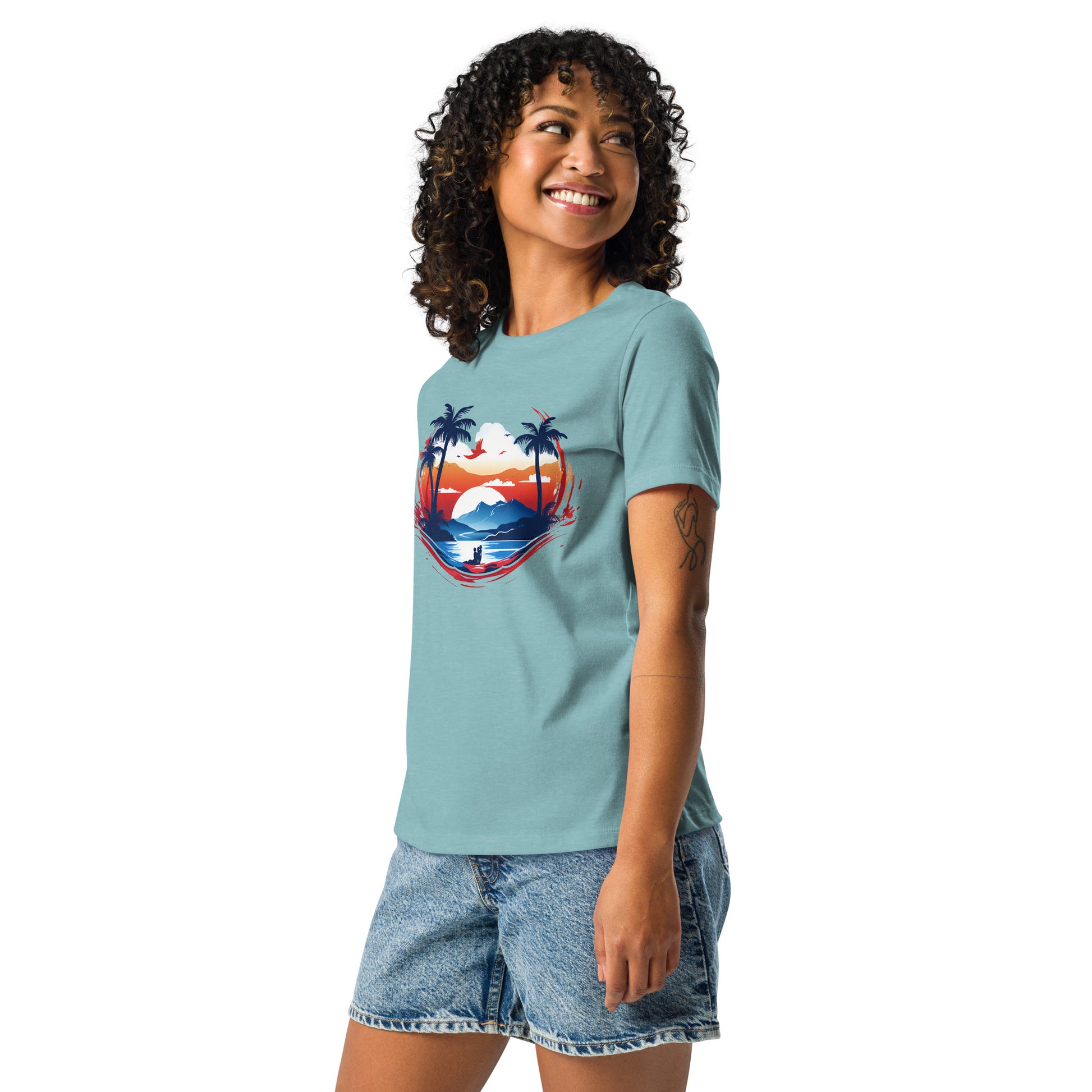 Women with blue lagoon t-shirt with picture of sunset and palm trees