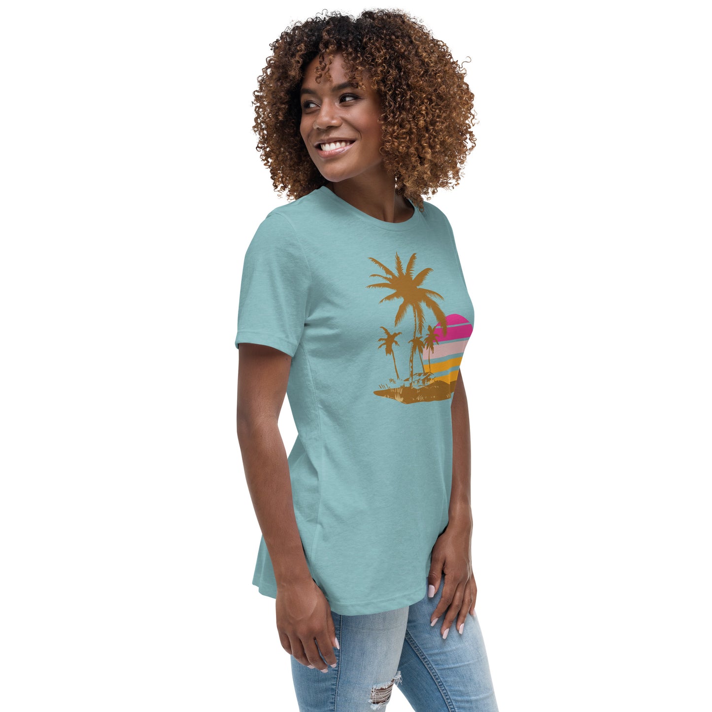 Woman with blue lagoon T-shirt and a picture of brown palm trees and a pink sunset