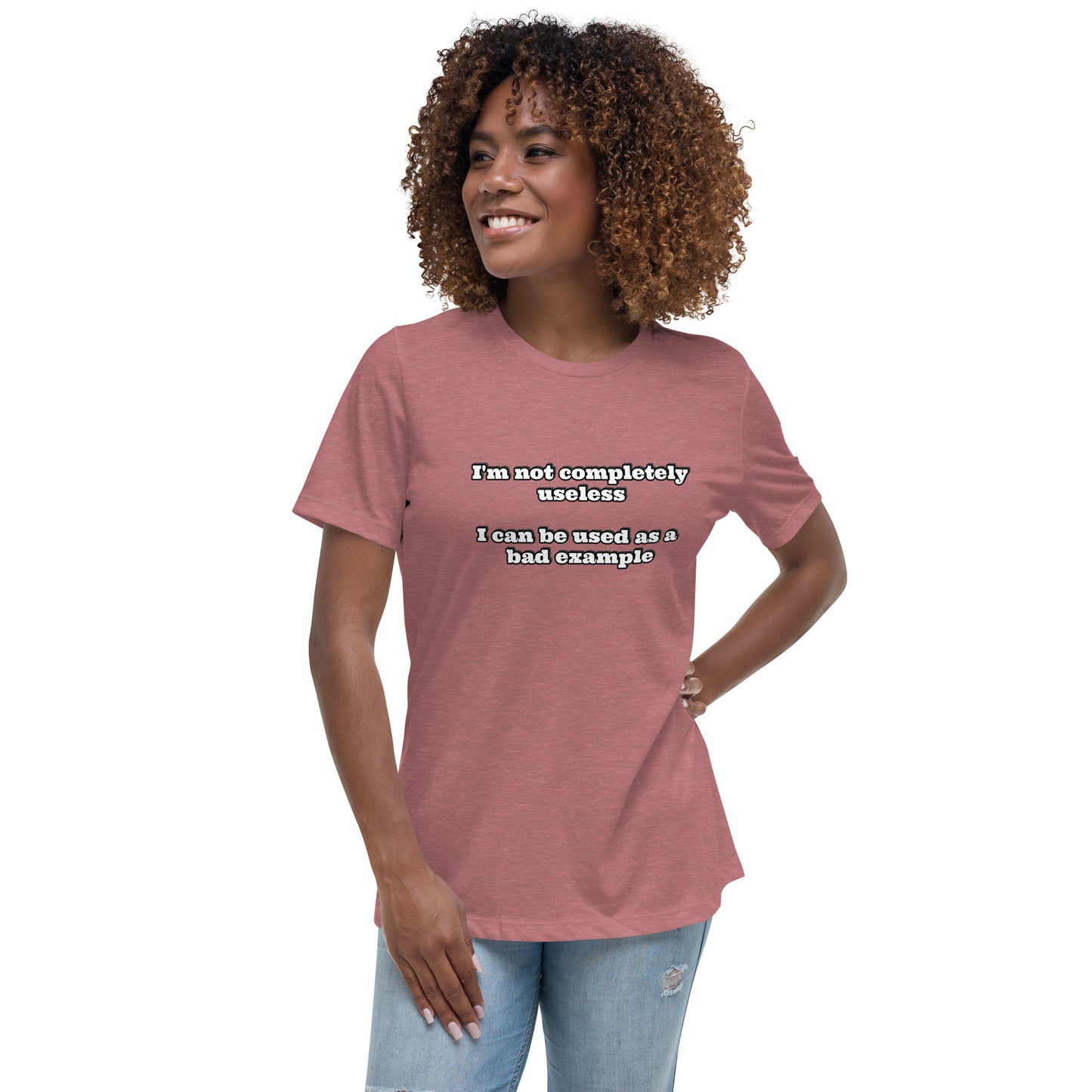 Women with mauve t-shirt with text “I'm not completely useless I can be used as a bad example”