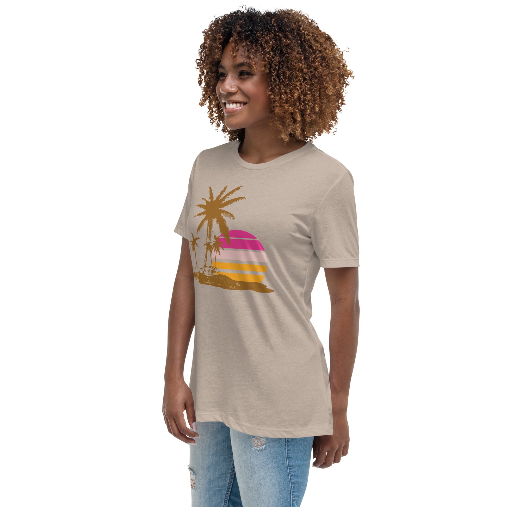 Woman with stone T-shirt and a picture of brown palm trees and a pink sunset