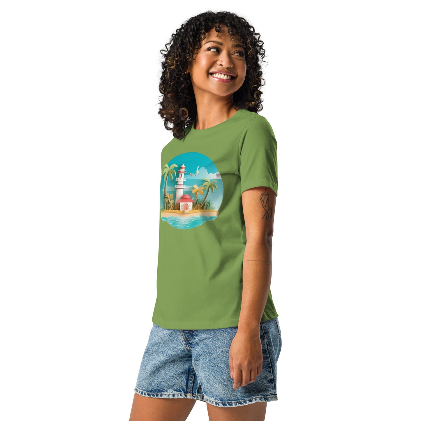 Woman with leaf green t-shirt with picture of lighthouse and palm trees