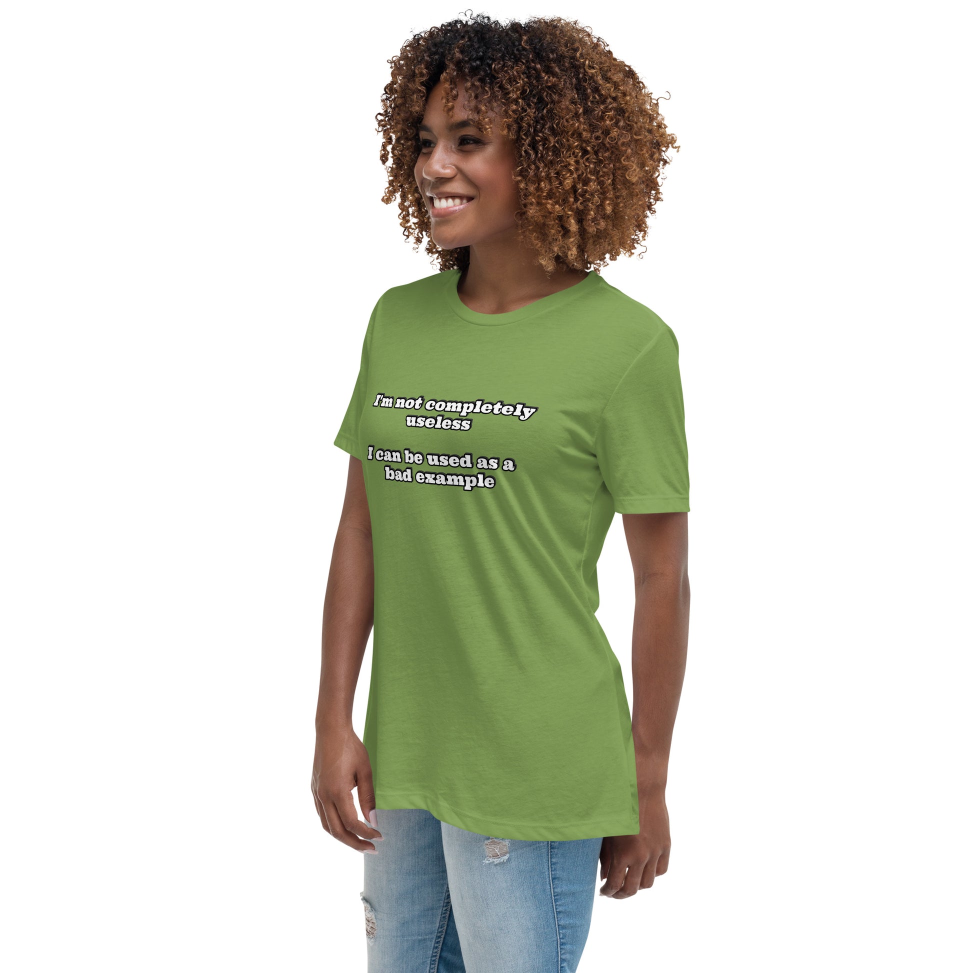 Women with leaf green t-shirt with text “I'm not completely useless I can be used as a bad example”