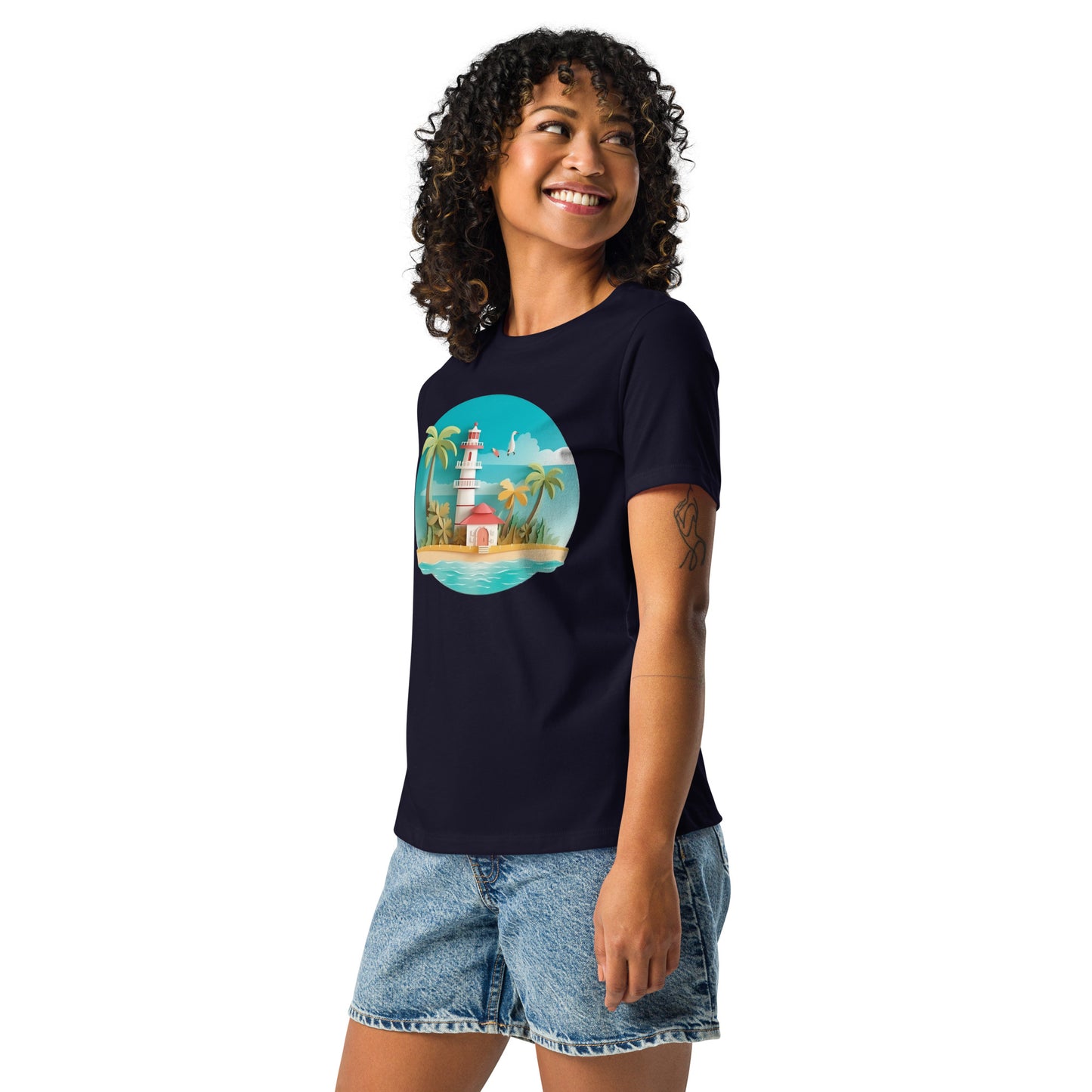 Woman with navy blue t-shirt with picture of lighthouse and palm trees